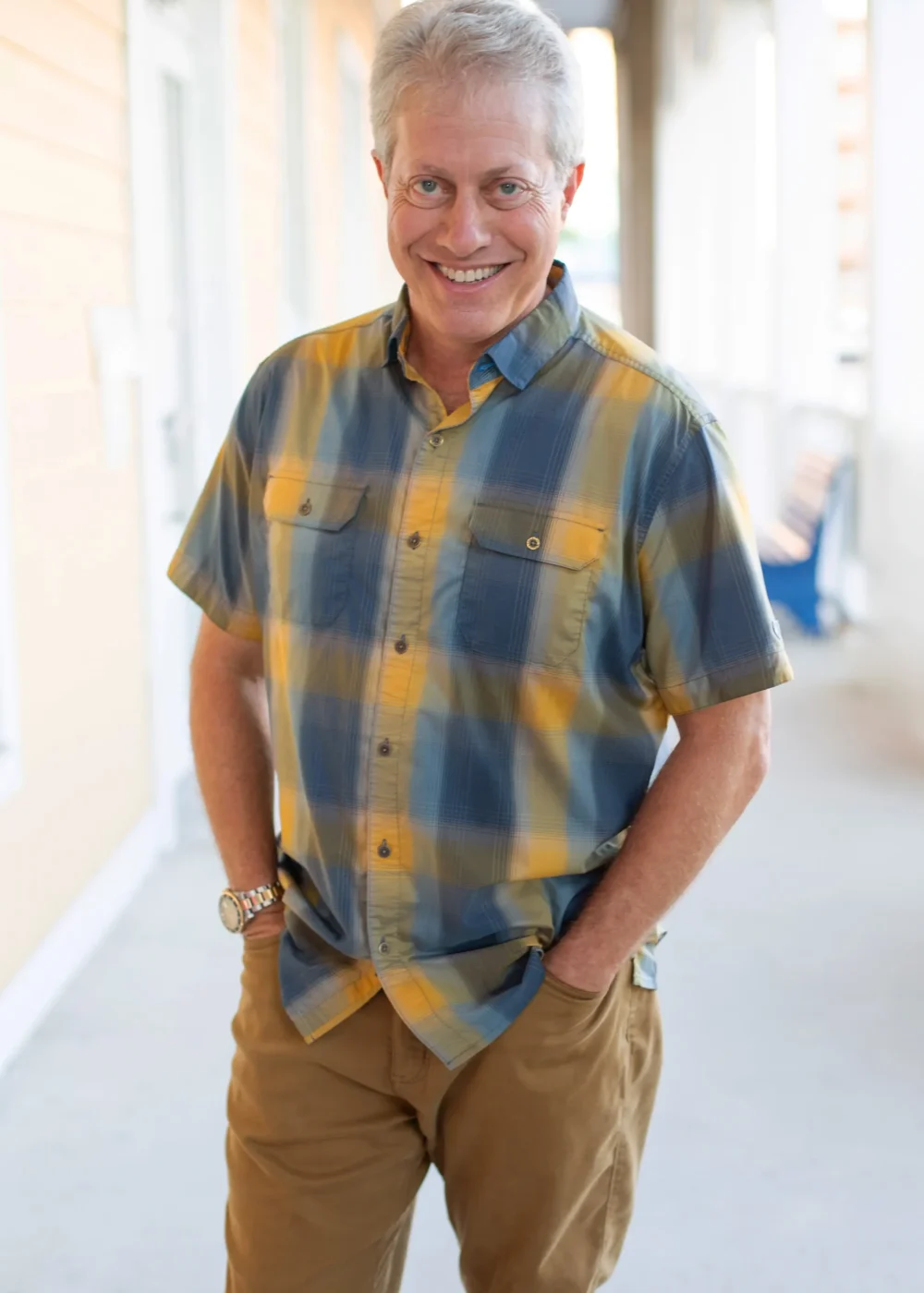 Scott Shimberg blue yellow shirt khakis standing PNG