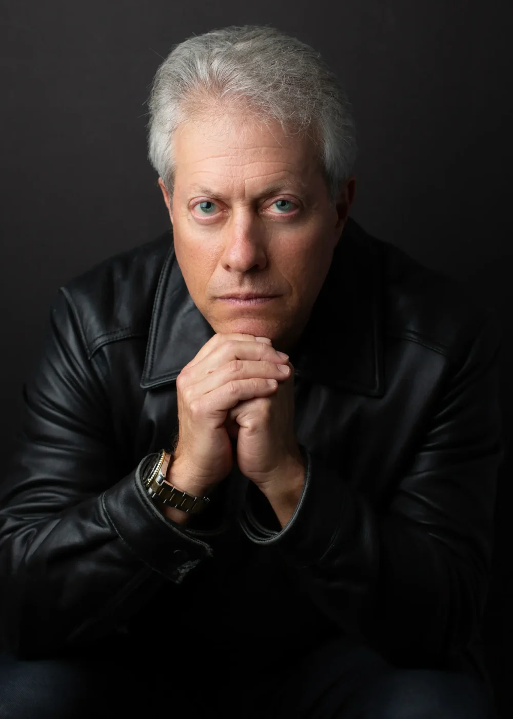 Scott Shimberg leather coat closeup with hands PNG