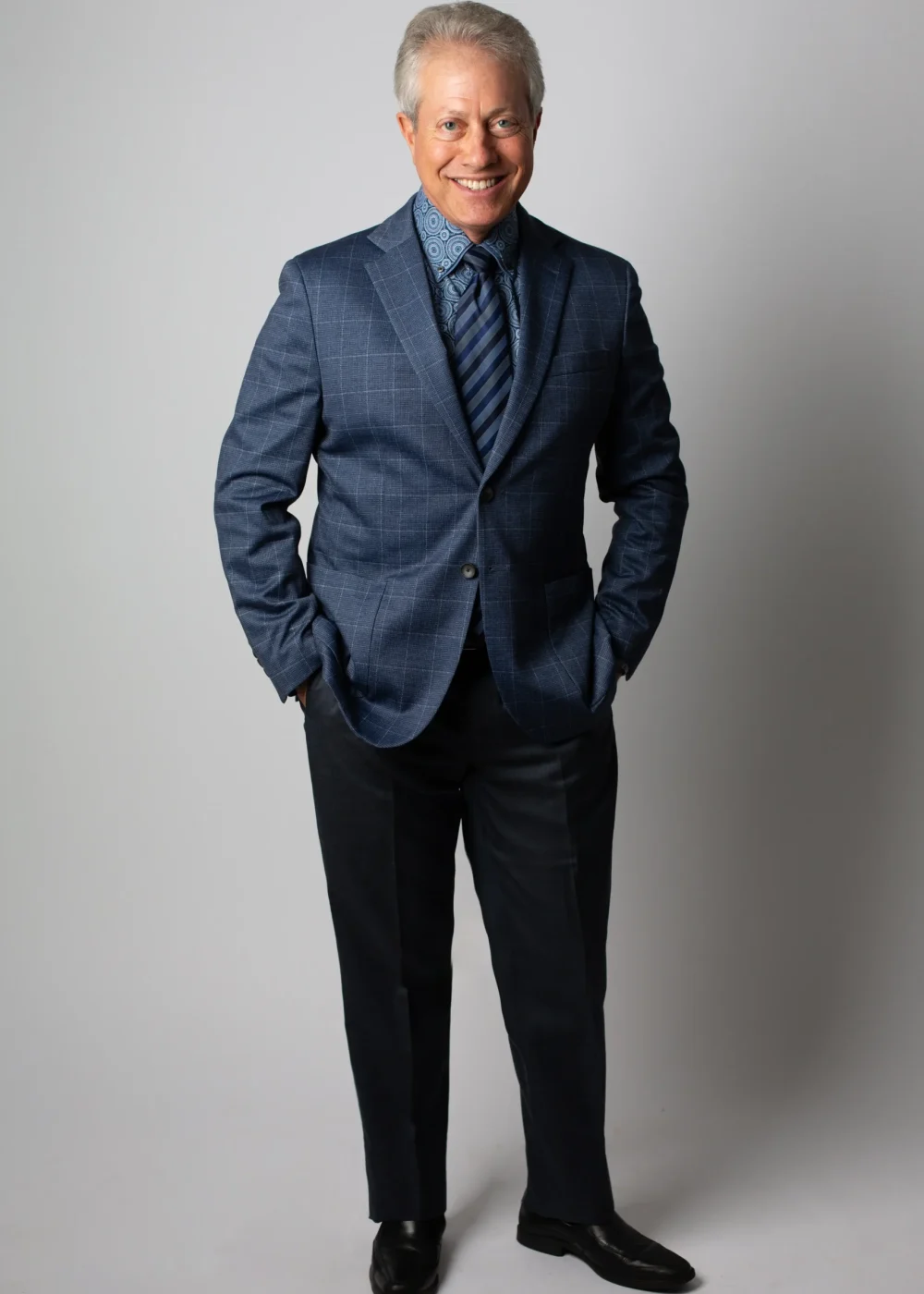 Scott Shimberg suit hands in pockets PNG